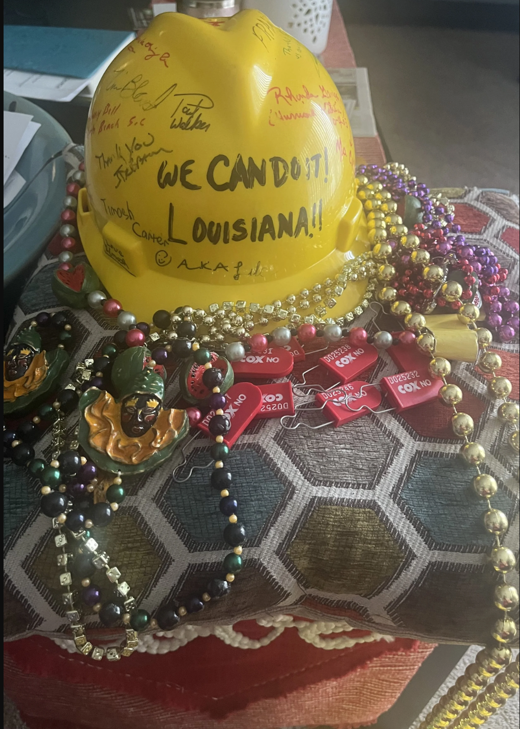 C360 Surveillance hard hat signed by team members during Hurricane Katrina relief efforts in Louisiana